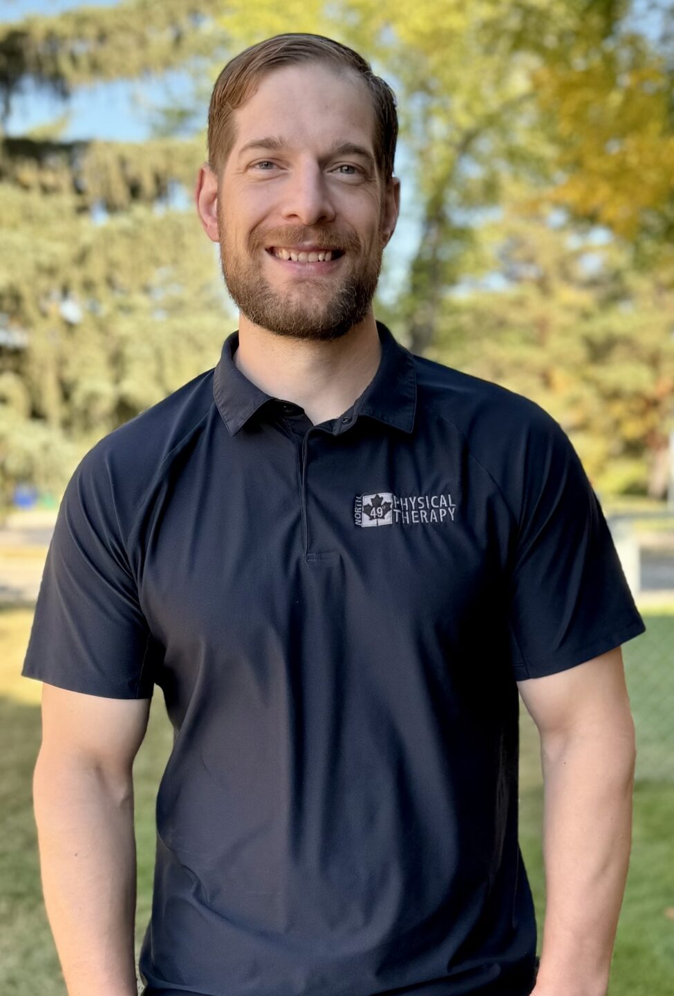 IMG_4837 Michael Tweten, a physiotherapist, crossed arms size edited